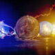 Bitcoin Stock Growth. Chart shows a strong increase in the price of bitcoin. Bitcoin gold coin and defocused chart background. Virtual cryptocurrency concept.